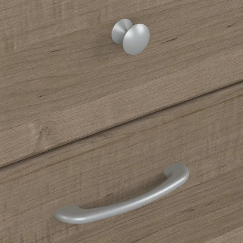 Bureau informatique avec étagère et tiroirs.