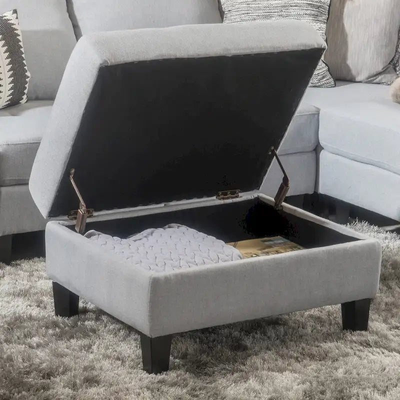 Pouffe de rangement en tissu capitonné