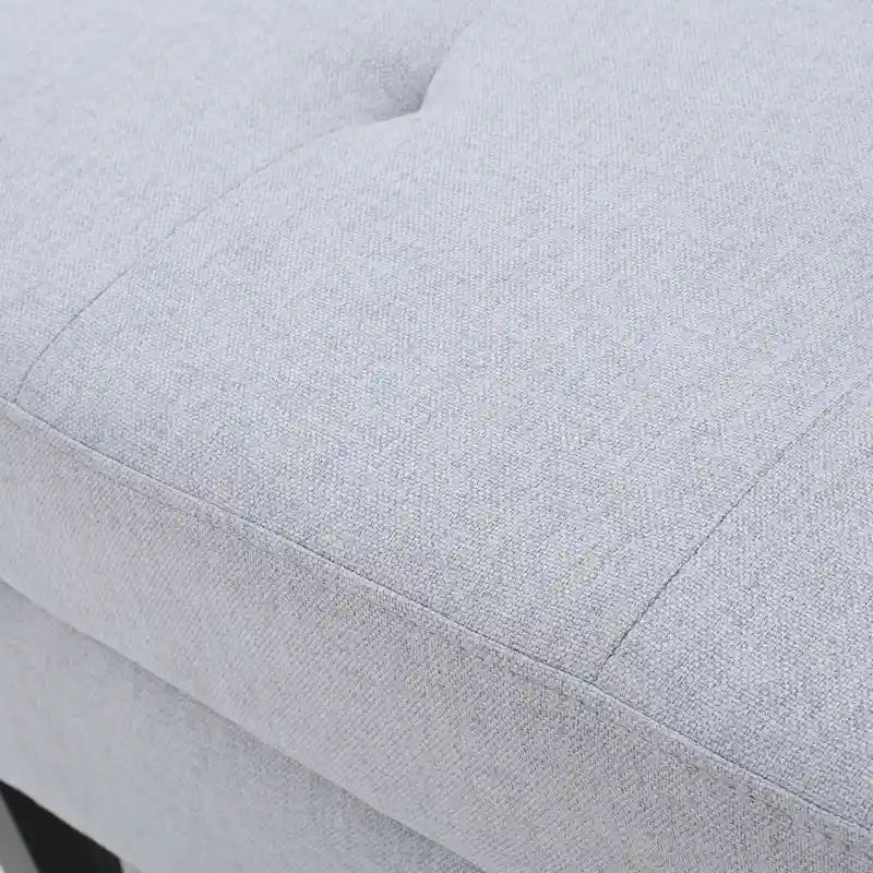 Pouffe de rangement en tissu capitonné