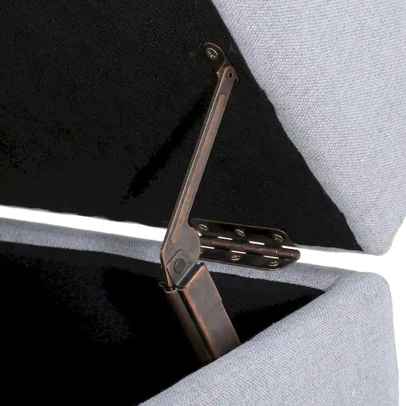 Pouffe de rangement en tissu capitonné