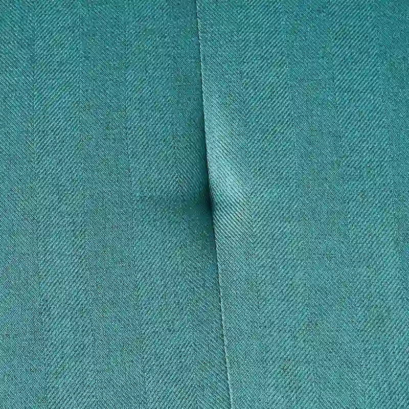 Pouffe de rangement en tissu capitonné