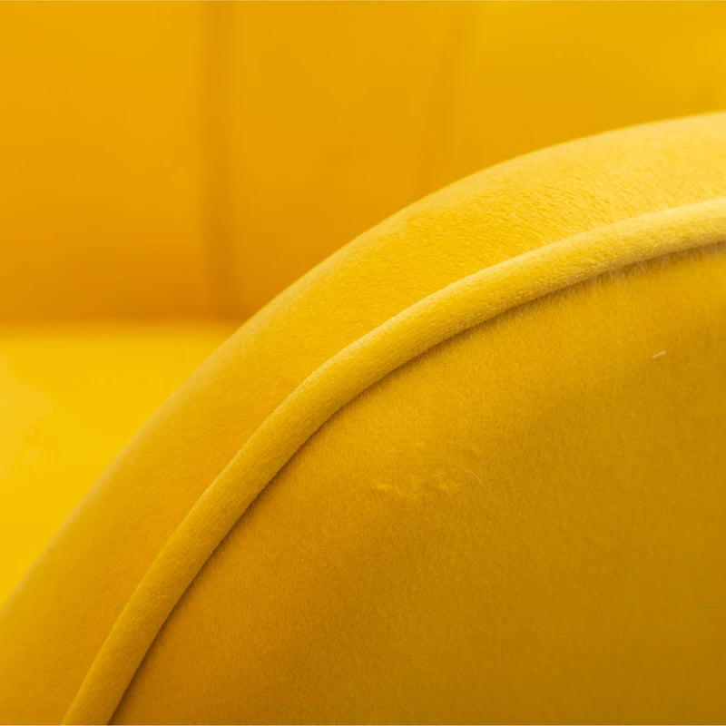 Fauteuil capitonné en velours avec repose-pieds