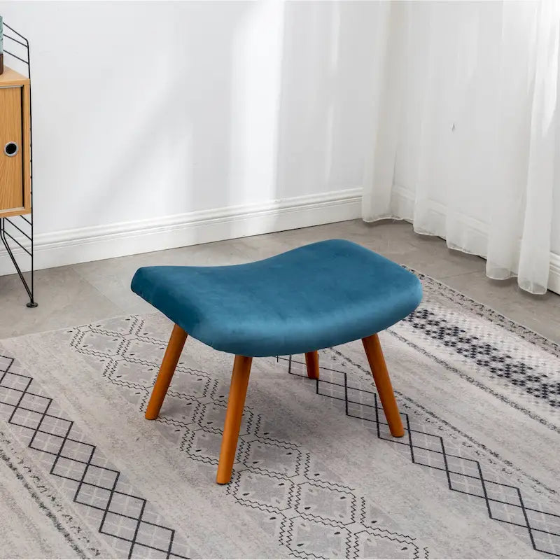 Fauteuil capitonné en velours avec repose-pieds