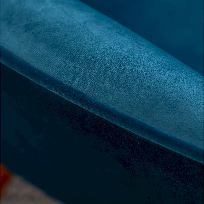 Fauteuil capitonné en velours avec repose-pieds