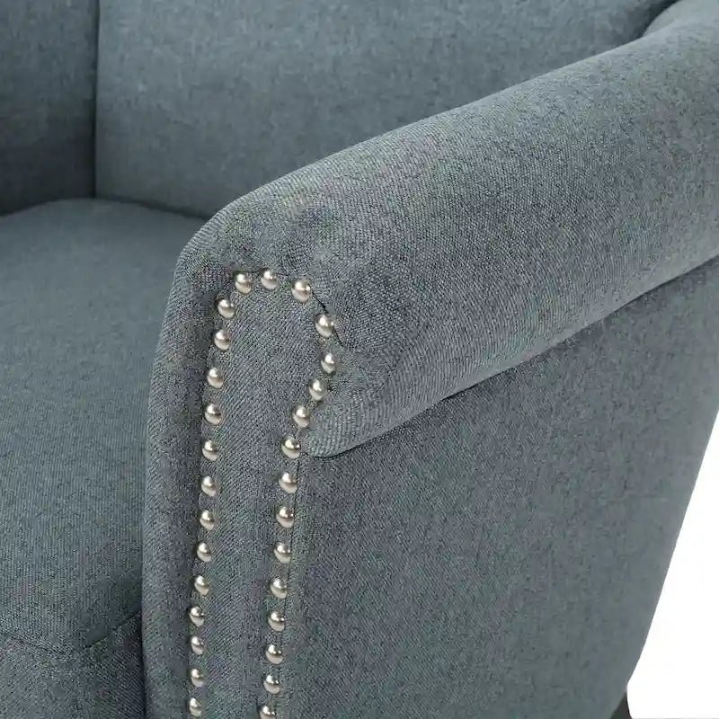 Fauteuil club moderne à oreilles, orné de détails cloutés