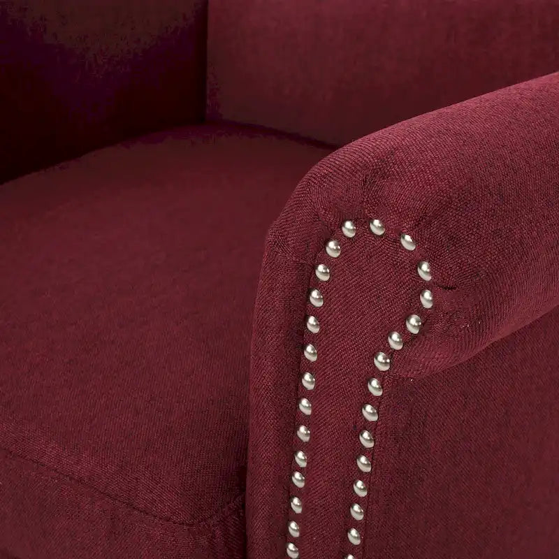 Fauteuil club moderne à oreilles, orné de détails cloutés