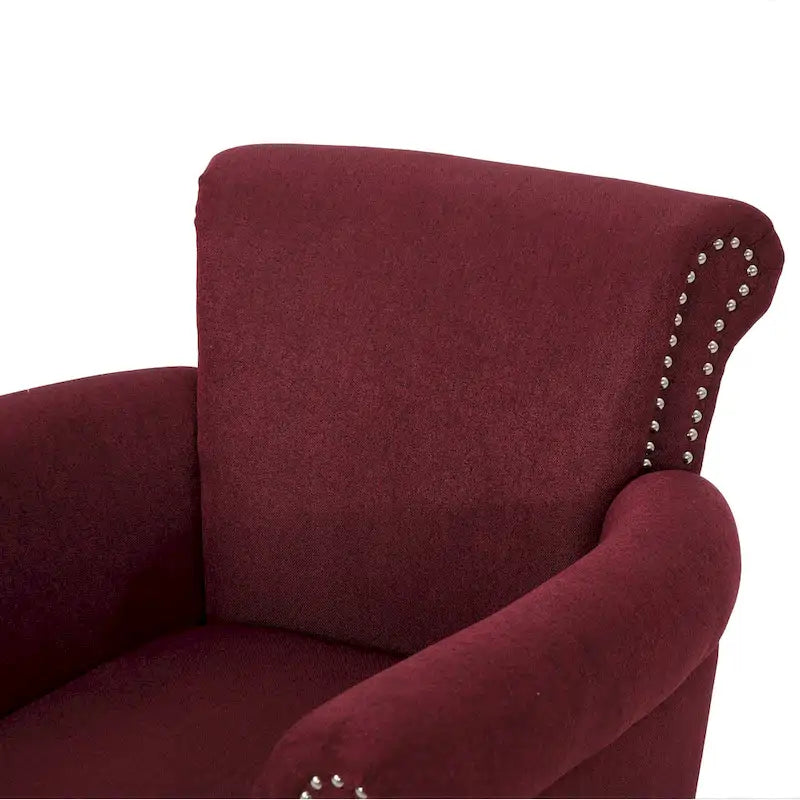 Fauteuil club moderne à oreilles, orné de détails cloutés