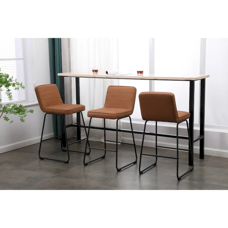 Ensemble de trois tabourets de bar modernes et rembourrés