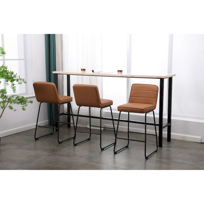 Ensemble de trois tabourets de bar modernes et rembourrés