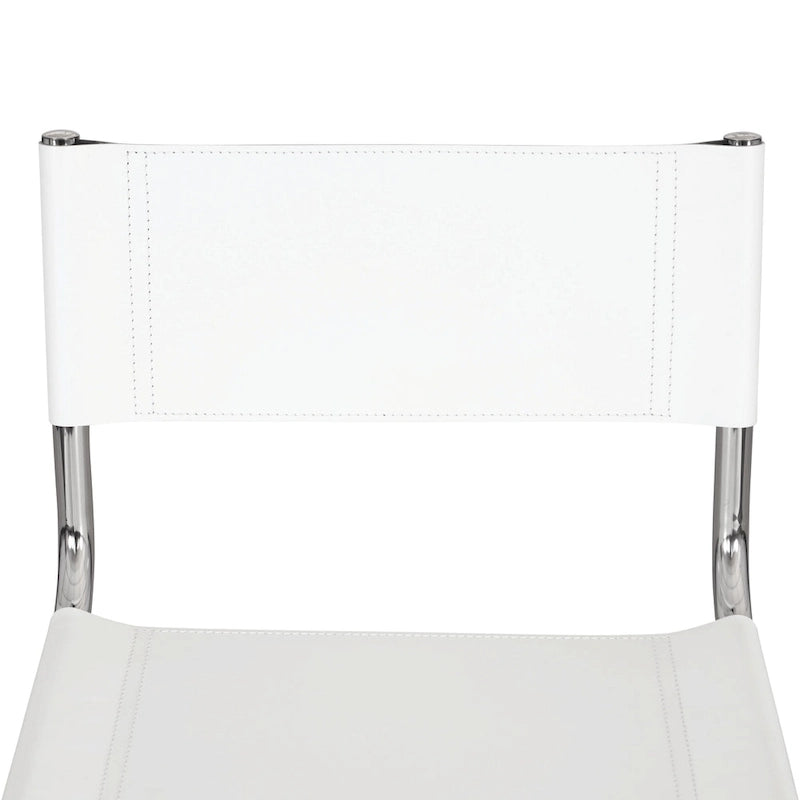 Fauteuils cantilever à structure chromée (disponibles en plusieurs coloris de similicuir).